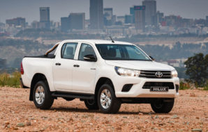 Toyota hits record sales, but marred by floods